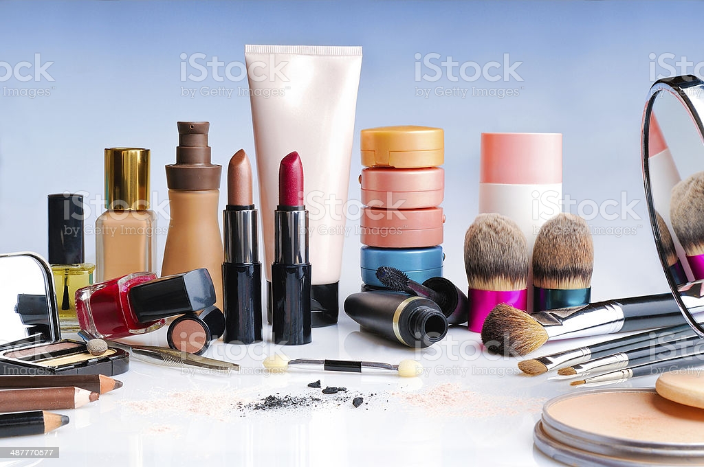 makeup set on glass table front view